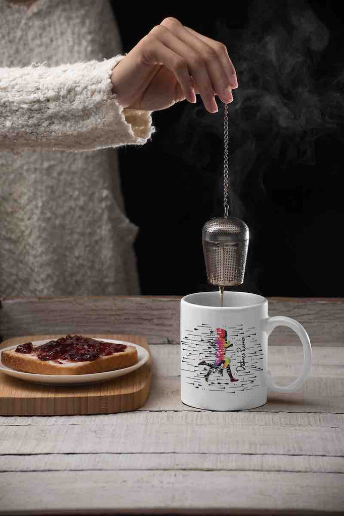 This white coffee mug image has with a colorful female silhouette and the words "Distance Runner" printed on it. It is made from durable ceramic and it's microwave and dishwasher friendly. It is also the ideal gift for any female Distance Runner in your life.