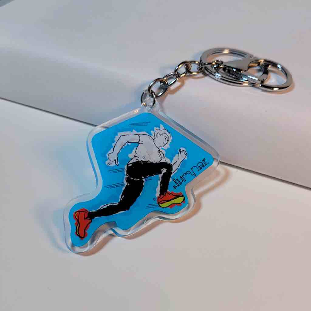 A clear acrylic keychain featuring a detailed design of a shot put thrower in action, a unique and stylish way to show love for track and field athletes.