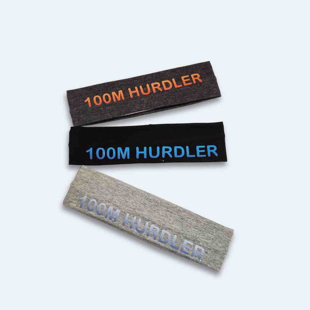 100M Hurdler Headband with the words '100M HURDLER' printed in bold letters, showcasing its style and functionality for track and field athletes. Made with 100% cotton for absolute comfort.