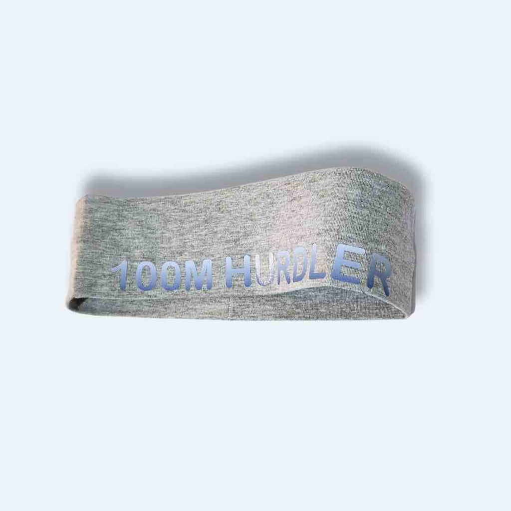 100M Hurdler Headband with the words '100M HURDLER' printed in bold letters, showcasing its style and functionality for track and field athletes. Made with 100% cotton for absolute comfort.