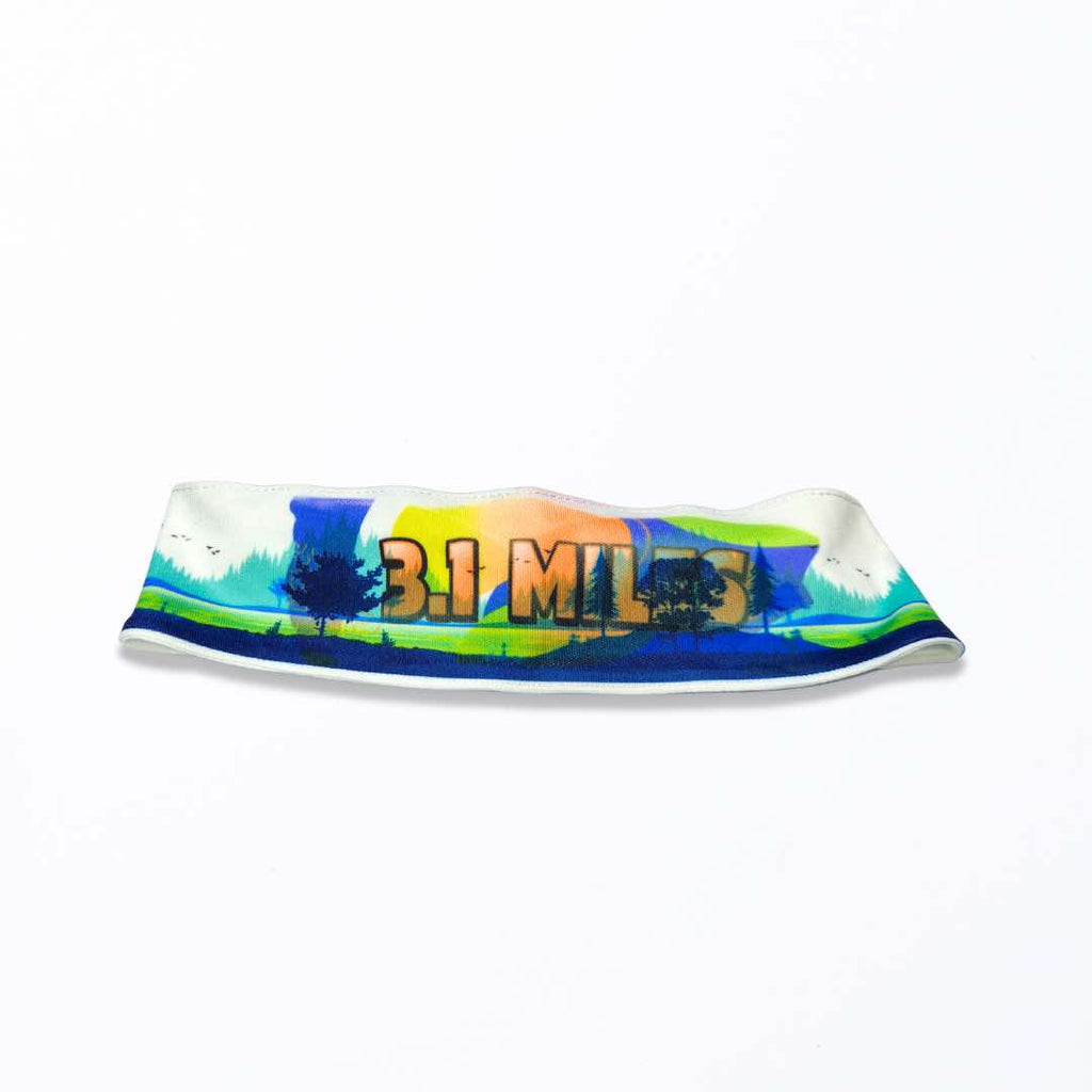 Image of a sports headband with the words "3.1 Miles" lettering on it. The headband is made of a soft and stretchy polyester fabric with a silicone grip on the inside to prevent slipping. It’s also an ideal gift for track and field athletics.
