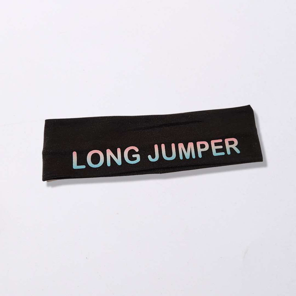 This high-quality headband has the words "Long Jumper" boldly printed on the front in ombre color. It is made from 100% cotton fabric, wicks moisture and features a silicone hold to ensure that it stays in place.