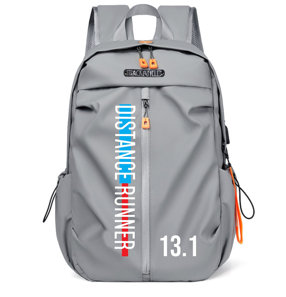 The text ‘Distance Runner’  and ’13.1’ is colorfully printed on the front of this backpack. The print is in shades of white, blue and red. The backpack has a variety of pockets and compartments, making it ideal for athletes. It can also be a great gift.