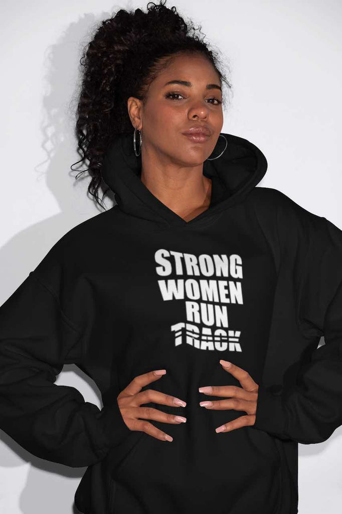 This is an image of a black hoodie with a bold white print of the words 'Strong Women Run Track' on it. It's a gift that inspires, motivates, and celebrates the incredible strength of female athletes.