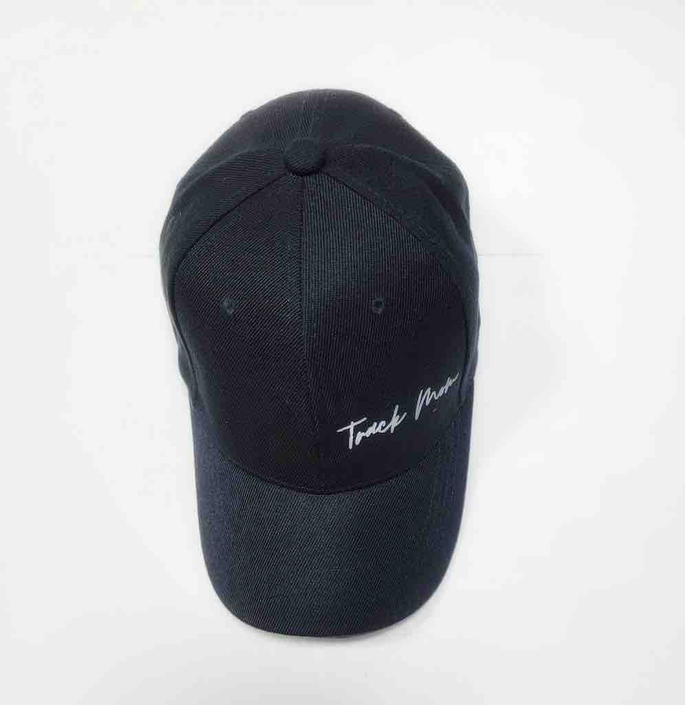 A stylish black face cap with the words "Track Mom" printed in white on the front. The cap has a curved brim, an adjustable strap closure, and is the ideal gift all track and field moms, enthusiast and  supporters.