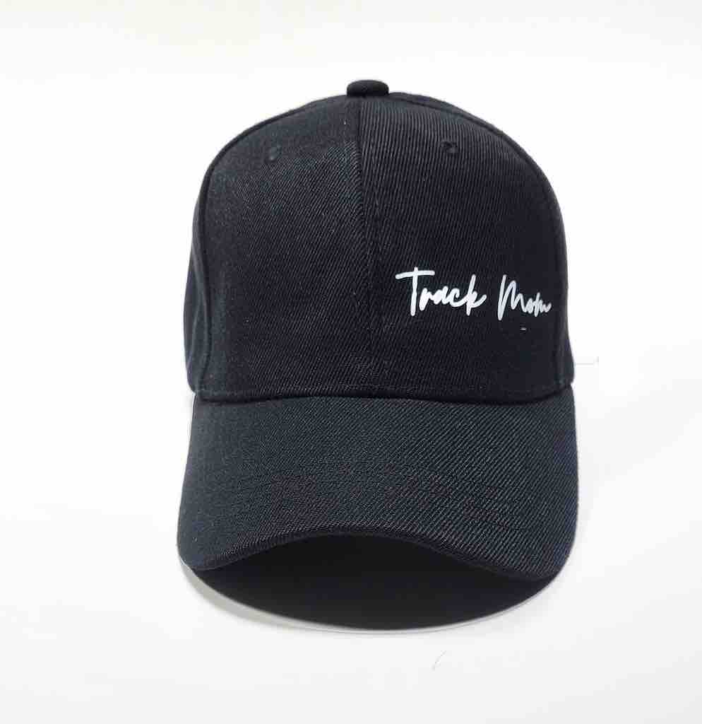 A stylish black face cap with the words "Track Mom" printed in white on the front. The cap has a curved brim, an adjustable strap closure, and is the ideal gift all track and field moms, enthusiast and  supporters.